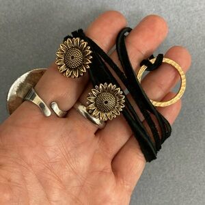 Gold Toned Sunflower Charm Lariat Necklace with Black Suede Cord